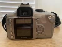 Canon EOS 300D Digital Camera body, battery pack, neck strap, user guides