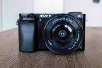 Sony A6000 w/ lens and dive housing with handle