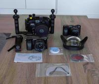 Sony A6000 w/ lens and dive housing with handle