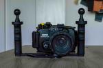 Sony A6000 w/ lens and dive housing with handle